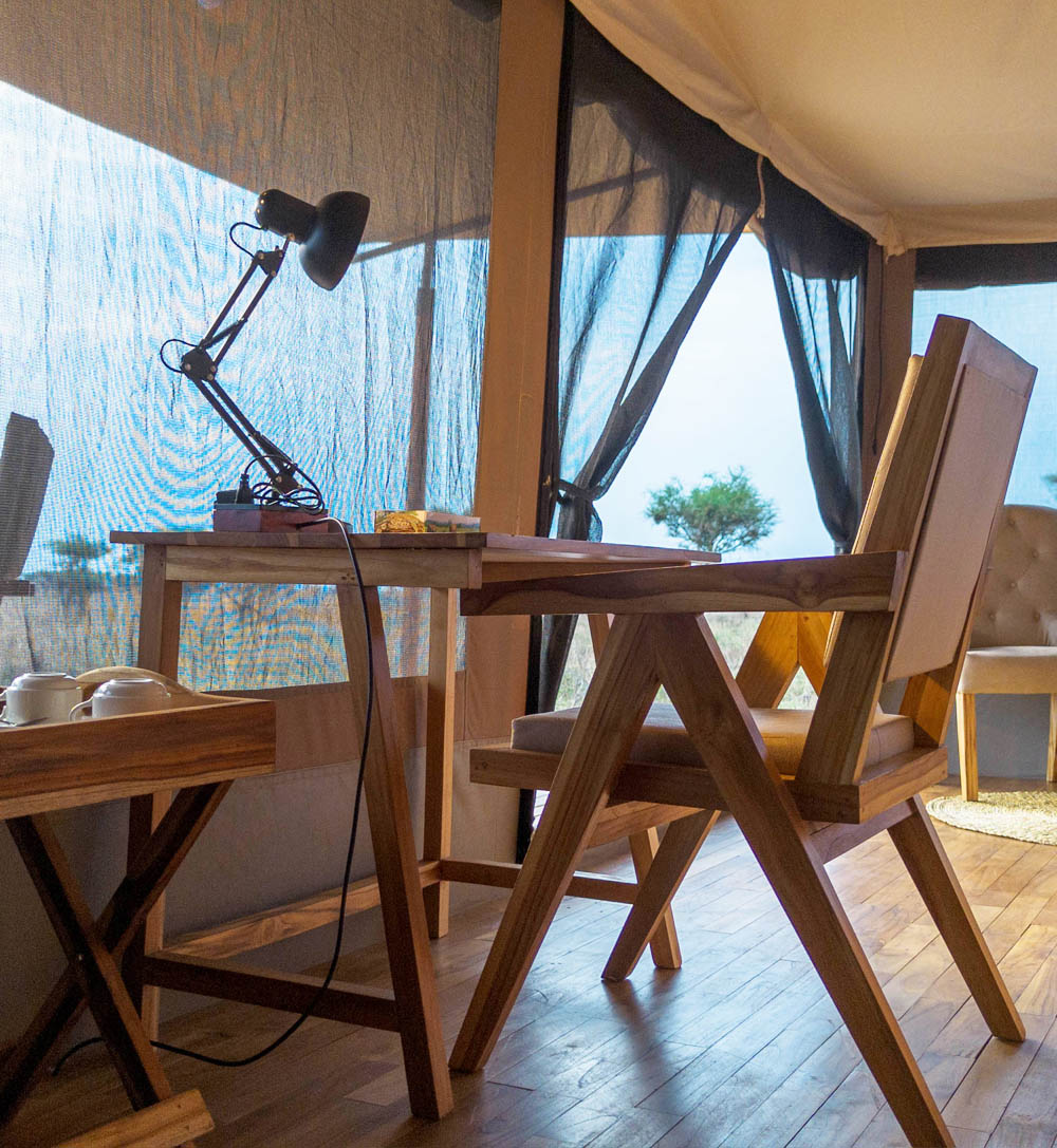 Luxury Serengeti safari experience with golden sunrise, wildlife, and grasslands at Manya Luxury Camps
